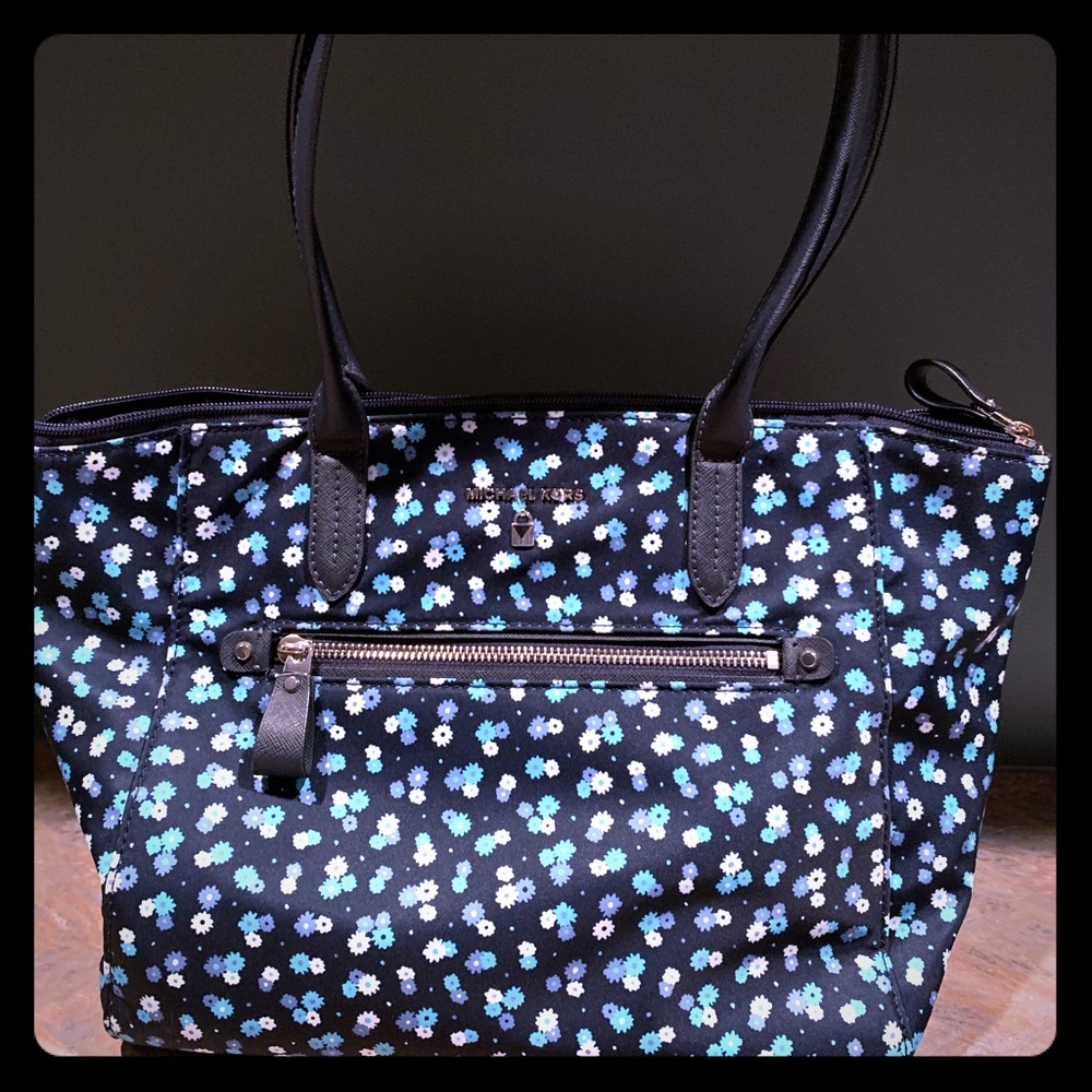 Michael Kors canvas shoulder bag.